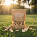 Organic Ashwagandha Root pouch bag outdoors on green grass with sunshine