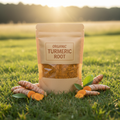 Organic Turmeric Root in kraft paper pouch bag outdoors with golden sunshine